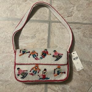 Anthropologie beaded mini bag with skiers. Winter 2024.
